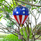 colorful balloon-shaped solar lantern glowing at night for yard decoration and outdoor charm